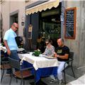 Stefano - Outdoor dining with friends/clients under the Tuscan Sun (Cortona)